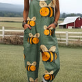 Oversized Bee Print Adjustable Strap Roll Cuff Casual Jumpsuit